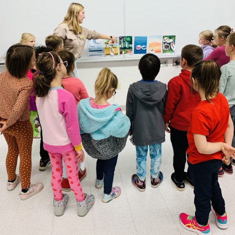 nmu student leading discussion with young students