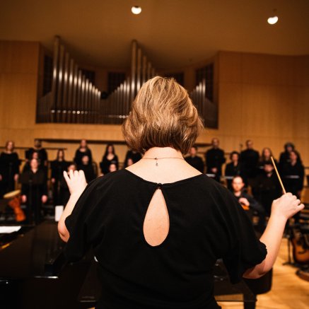 Dr. Erin Colwitz directs the choir in W23 Choir & Orchestra Concert