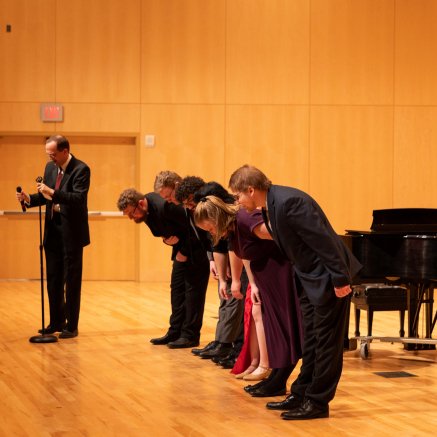 The 2023 Performance Scholarship Competition performers bow together front stage