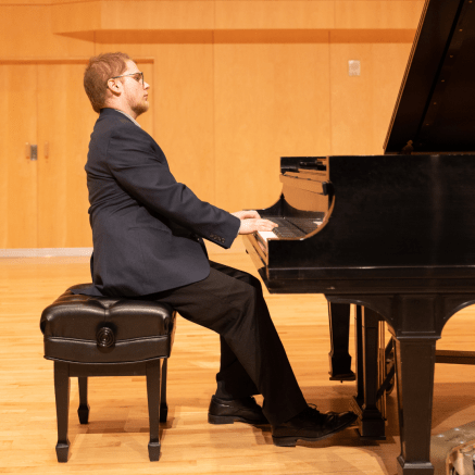 man playing a piano