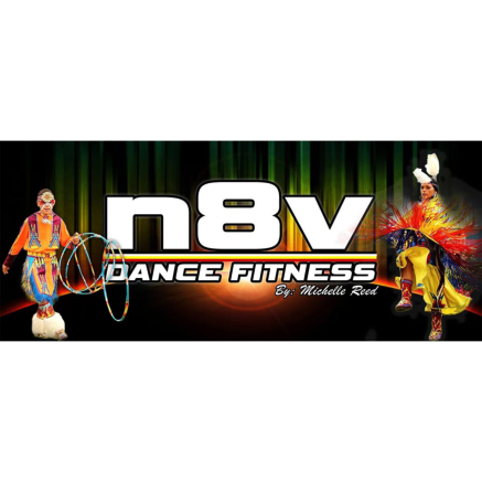 Colorful advertisement for "N8V Dance Fitness by Michelle Reed" featuring two dancers in vibrant traditional attire. One dancer is performing with hoops, while the other has a feathered headdress. The background has vertical green lighting effects.