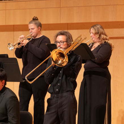 Erik performing in the Fall 2025 jazz concert with his trombone